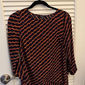 41 Hawthorn Navy and Orange Zigzag Blouse with pearl sleeve detail